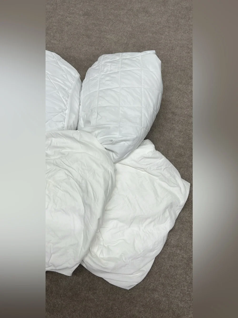 Assorted twin sheets and mattress protectors